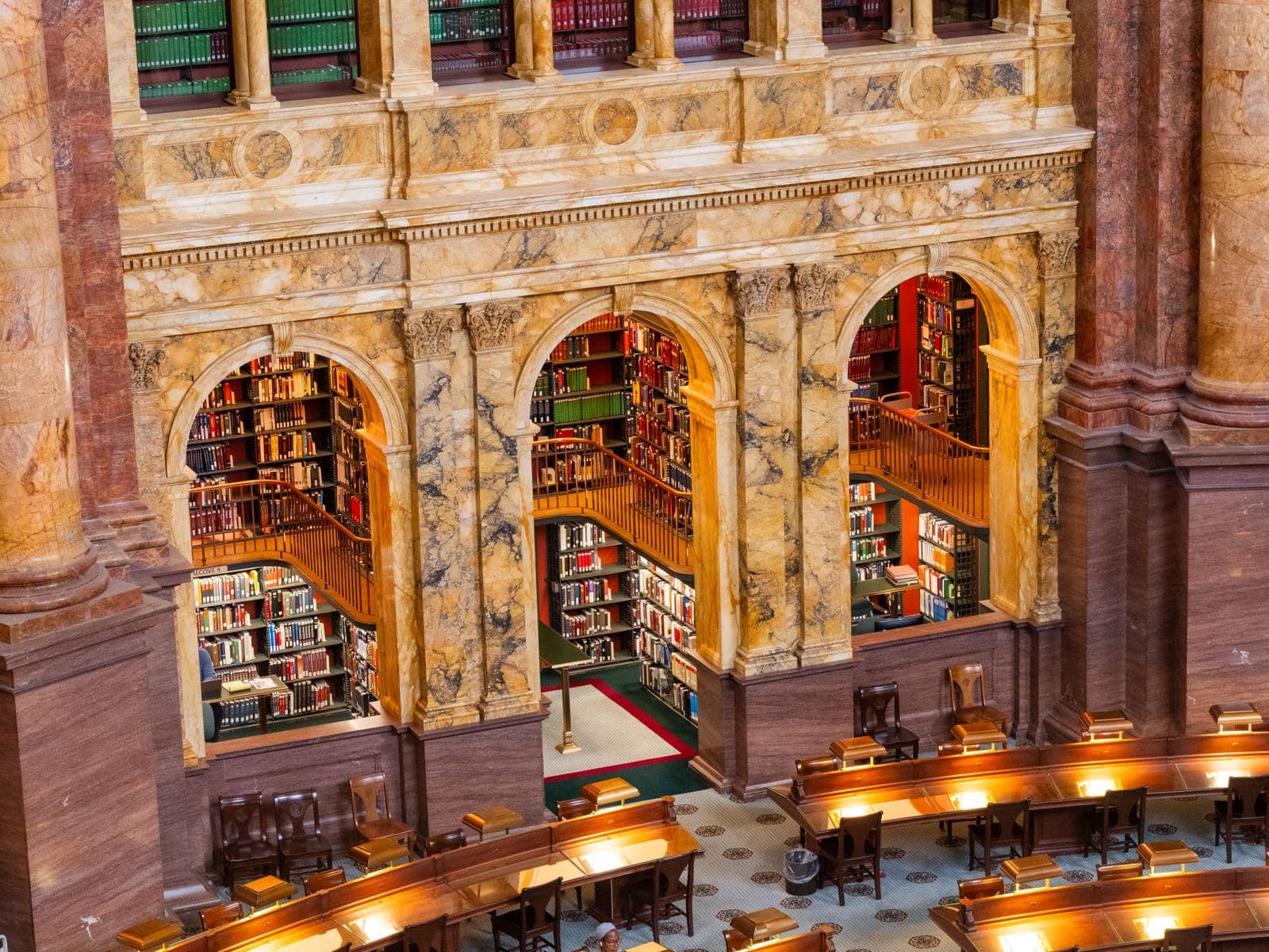 The interior of a grand library reading room